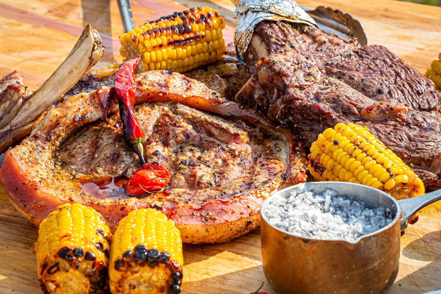 Tomahawk steak with grilled corn